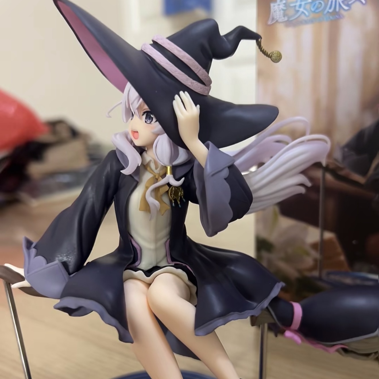 This is a photo of a figure from a side view.